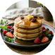 Stacked Pancakes with Maple Syrup